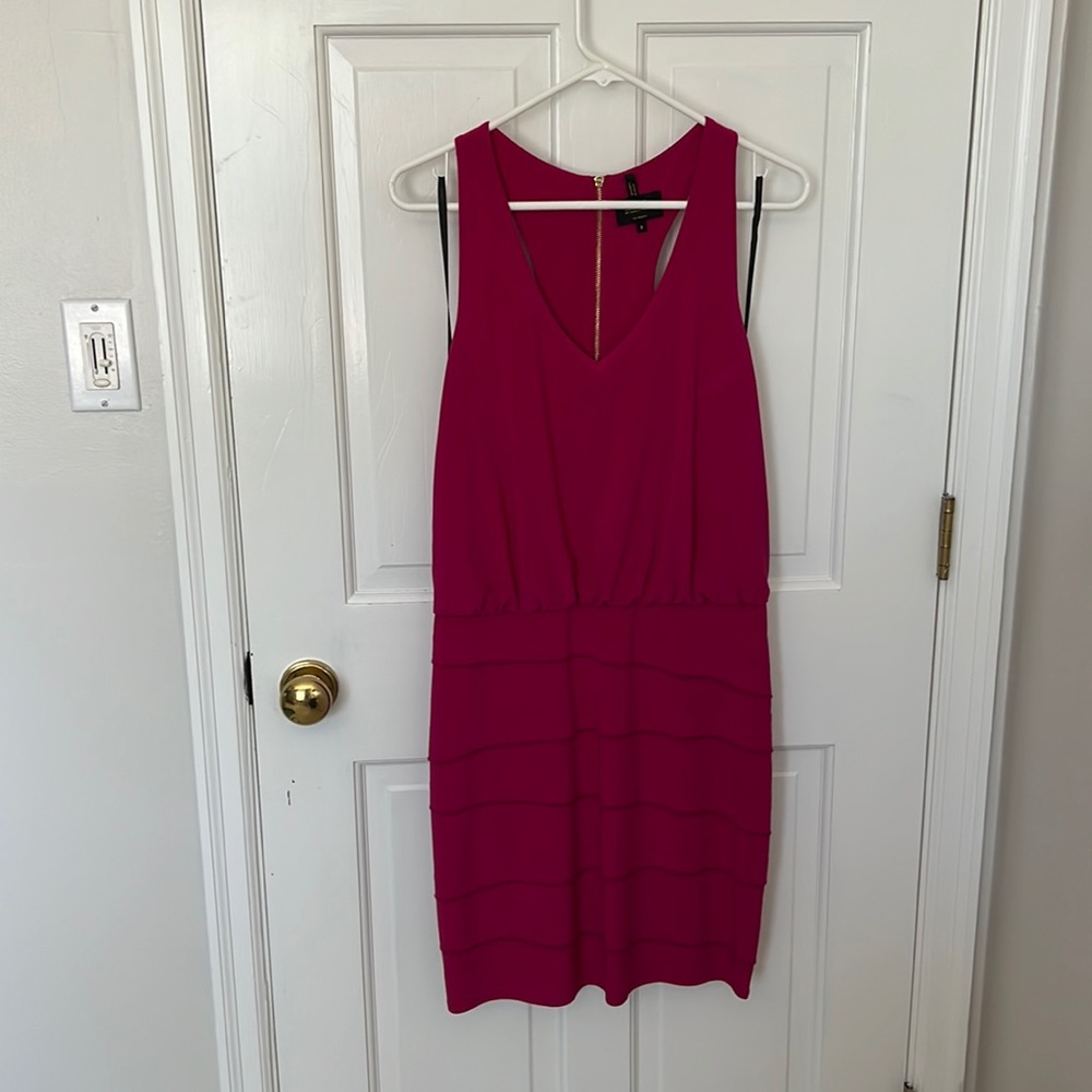 Magenta knee-length dress with racer-back and gold zipper details